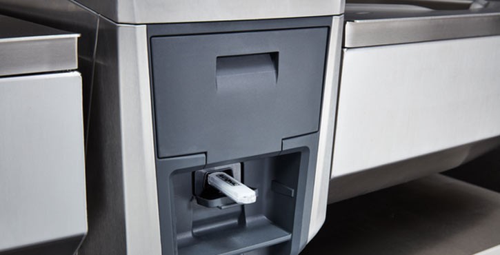USB stick plugged into RATIONAL iVario Pro cooking system interface.